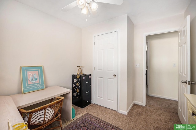 home office with ceiling fan, baseboards, and light colored carpet