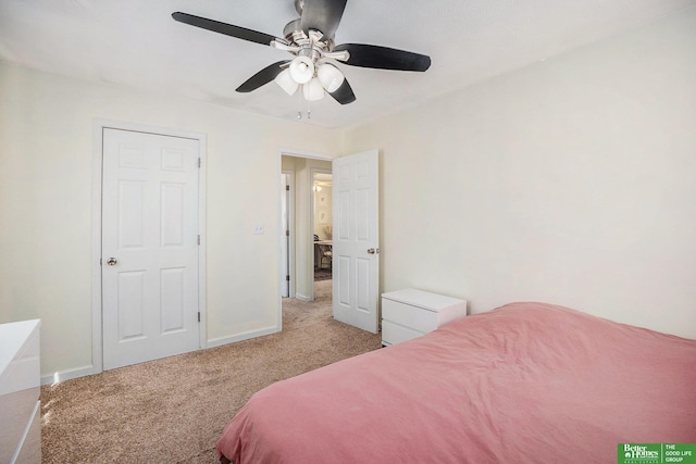 bedroom featuring light carpet, baseboards, and ceiling fan