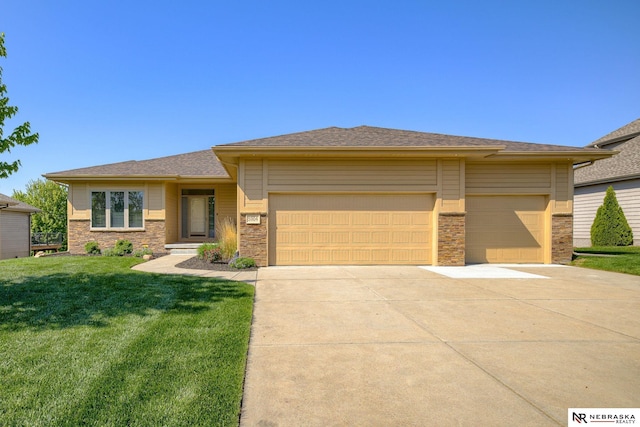 5904 N 153rd St, Omaha, NE 68116 - prairie-style house with an attached garage, concrete driveway, and a front lawn