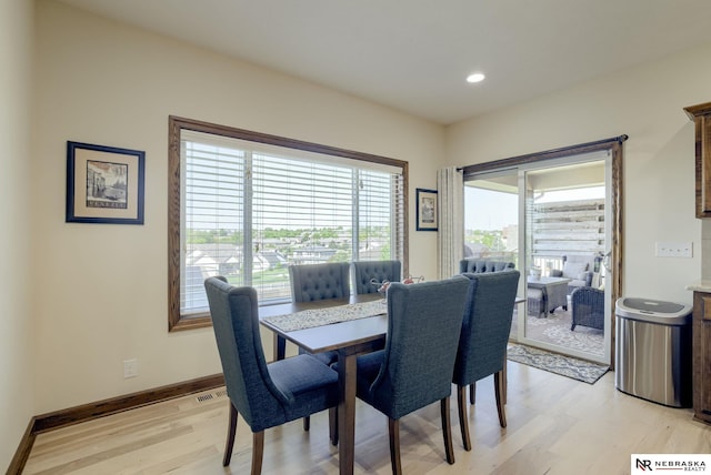 5904 N 153rd St, Omaha, NE 68116 - dining space featuring light wood finished floors, baseboards, and recessed lighting