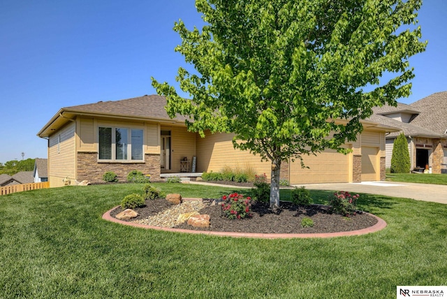 5904 N 153rd St, Omaha, NE 68116 - view of front of property featuring a garage, driveway, a front lawn, and brick siding