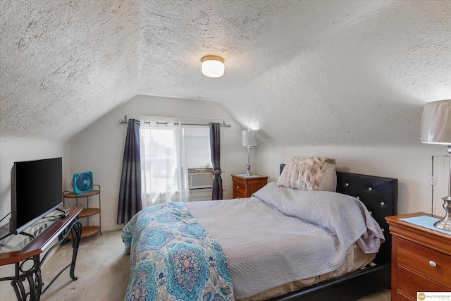 carpeted bedroom featuring a textured ceiling and vaulted ceiling