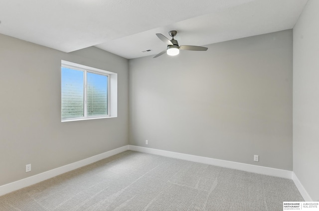 4803 N 192nd Ave, Elkhorn, NE 68022 - spare room with baseboards, a ceiling fan, and light carpet