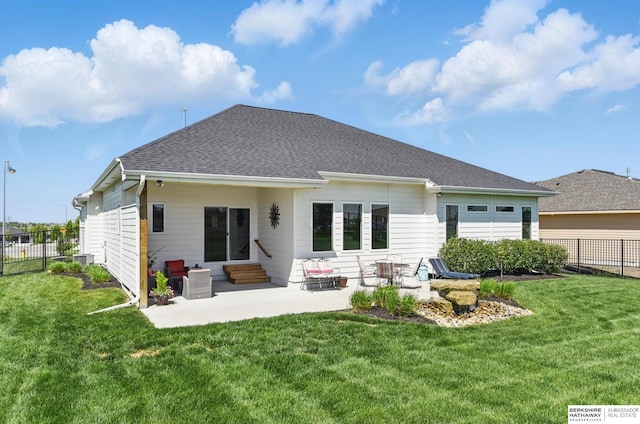 4803 N 192nd Ave, Elkhorn, NE 68022 - back of property with entry steps, a patio area, and roof with shingles