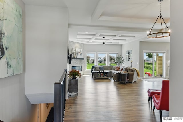 4803 N 192nd Ave, Elkhorn, NE 68022 - dining area with healthy amount of natural light, coffered ceiling, wood finished floors, ceiling fan, and beamed ceiling