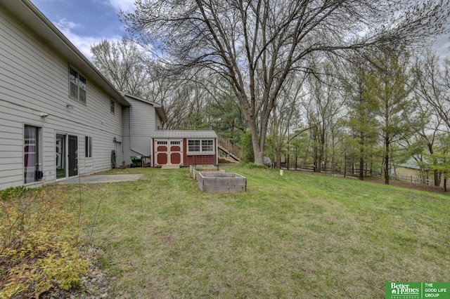10032 Kings Dr, Omaha, NE 68142 - view of yard with an outbuilding and a storage unit