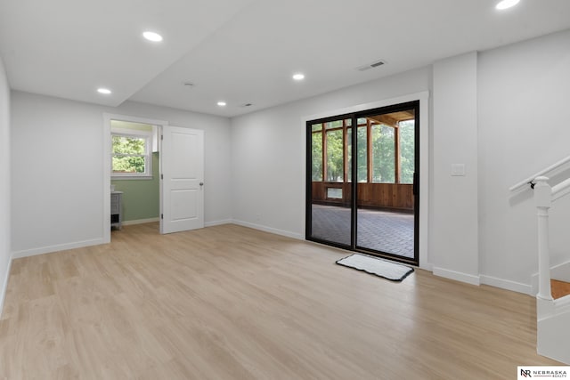 14611 Holmes St, Omaha, NE 68137 - spare room with plenty of natural light, light wood-style flooring, recessed lighting, and baseboards