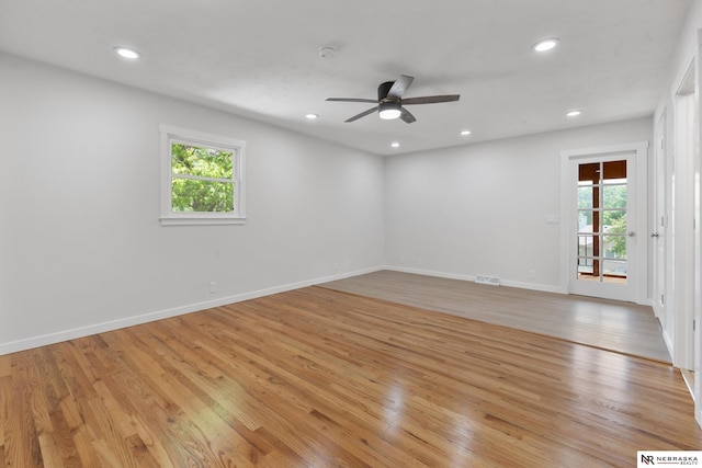 14611 Holmes St, Omaha, NE 68137 - unfurnished room with ceiling fan, light wood-style flooring, recessed lighting, and baseboards