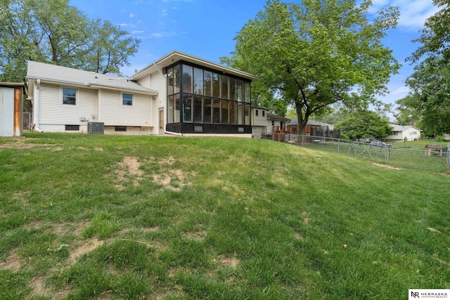 14611 Holmes St, Omaha, NE 68137 - back of house featuring a sunroom