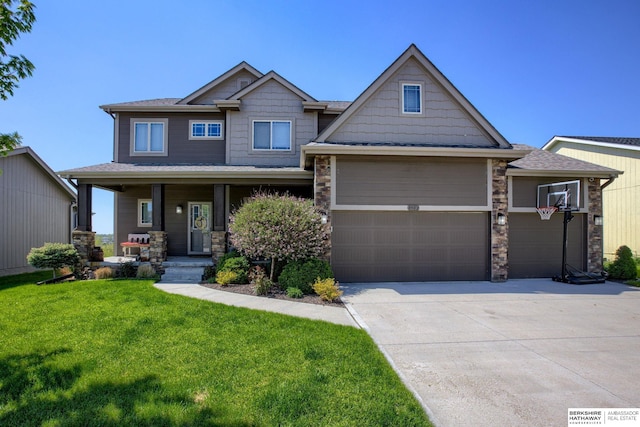8902 N 161st Ave, Bennington, NE 68007 - craftsman house featuring a porch, a front yard, concrete driveway, a garage, and a shingled roof