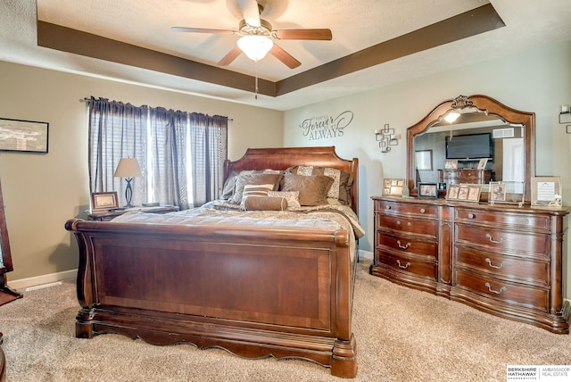 8902 N 161st Ave, Bennington, NE 68007 - bedroom featuring carpet floors, a raised ceiling, baseboards, and a ceiling fan
