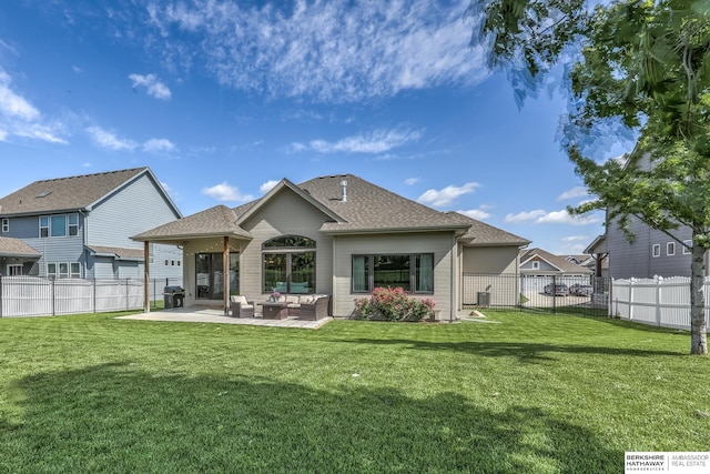 back of house featuring an outdoor hangout area, a patio area, and roof with shingles