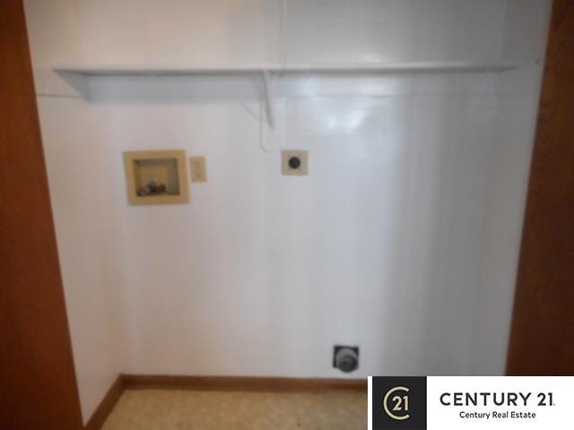 clothes washing area featuring washer hookup, electric dryer hookup, baseboards, and carpet floors
