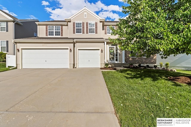 8917 N 157th St, Bennington, NE 68007 - view of front of house with driveway, a front lawn, and an attached garage