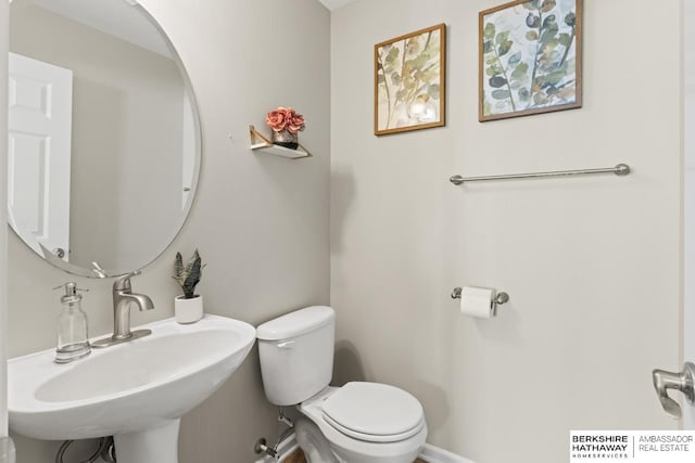 8917 N 157th St, Bennington, NE 68007 - half bathroom featuring a sink and toilet