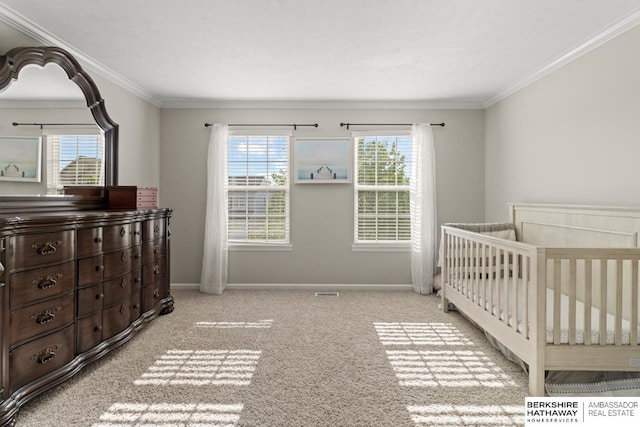 8917 N 157th St, Bennington, NE 68007 - bedroom featuring carpet flooring, ornamental molding, a nursery area, and baseboards