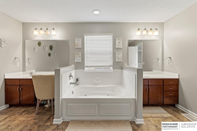 8917 N 157th St, Bennington, NE 68007 - bathroom with two vanities, a whirlpool tub, and baseboards