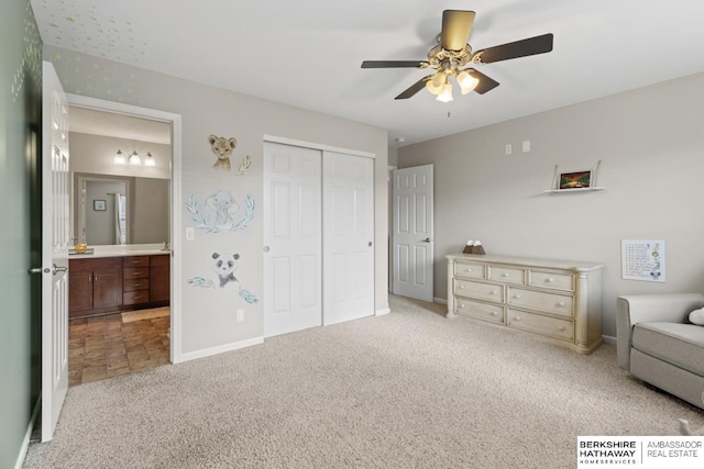 8917 N 157th St, Bennington, NE 68007 - bedroom featuring light carpet, ensuite bathroom, a closet, baseboards, and ceiling fan