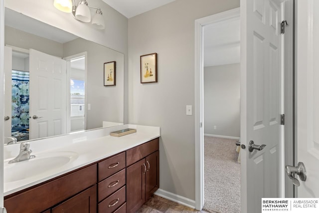 8917 N 157th St, Bennington, NE 68007 - bathroom featuring vanity and baseboards