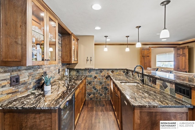 8917 N 157th St, Bennington, NE 68007 - kitchen featuring a sink, dark wood-type flooring, a wainscoted wall, brown cabinetry, and wine cooler