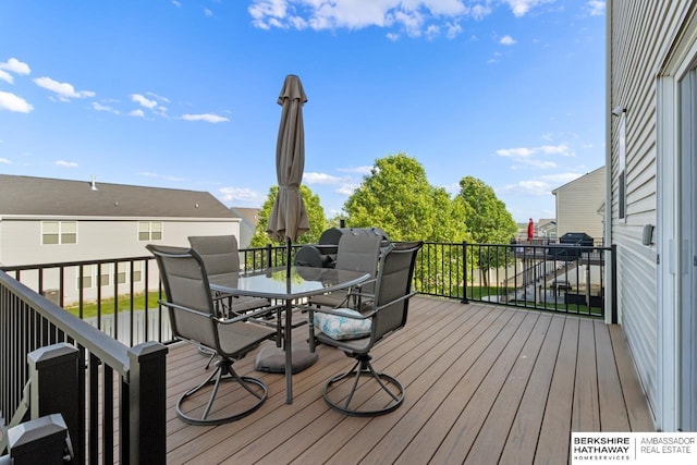 8917 N 157th St, Bennington, NE 68007 - wooden terrace with outdoor dining space