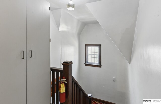 401 S 38th Ave, Omaha, NE 68131 - stairs featuring vaulted ceiling