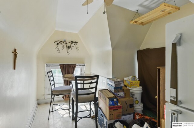 401 S 38th Ave, Omaha, NE 68131 - dining space with lofted ceiling, a ceiling fan, and baseboards