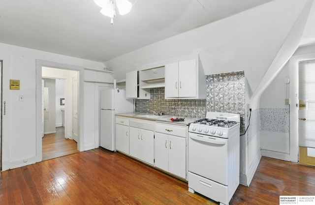 401 S 38th Ave, Omaha, NE 68131 - kitchen featuring white appliances, decorative backsplash, dark wood-style floors, and light countertops