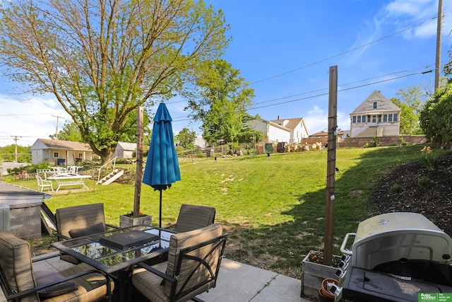 4921 Charles St, Omaha, NE 68132 - view of patio with outdoor dining area and a residential view