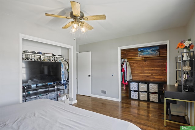 4921 Charles St, Omaha, NE 68132 - bedroom with wood finished floors, baseboards, and ceiling fan
