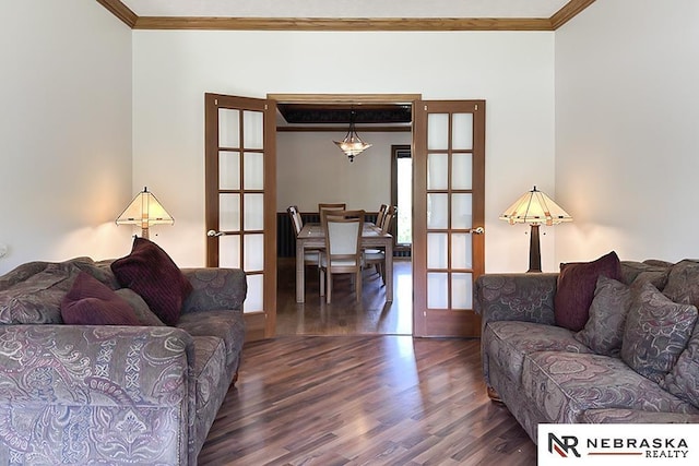 living area with ornamental molding, french doors, and wood finished floors