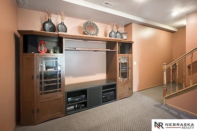 bar area with carpet floors, baseboards, and stairway