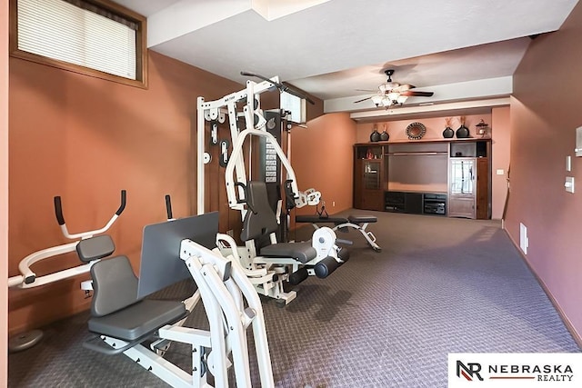workout area with ceiling fan and carpet floors