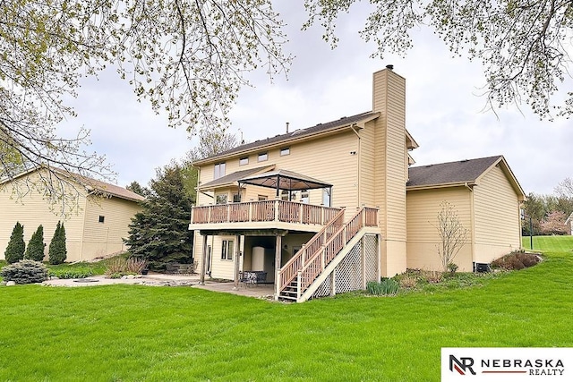 back of house featuring a patio area, a deck, a chimney, a gazebo, and stairs