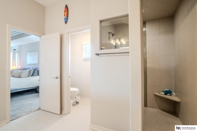 6707 S 209th St, Omaha, NE 68022 - bathroom featuring a walk in shower, toilet, tile patterned flooring, ensuite bathroom, and baseboards