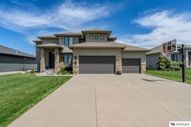 6707 S 209th St, Omaha, NE 68022 - prairie-style home featuring stone siding, a garage, concrete driveway, and a front lawn