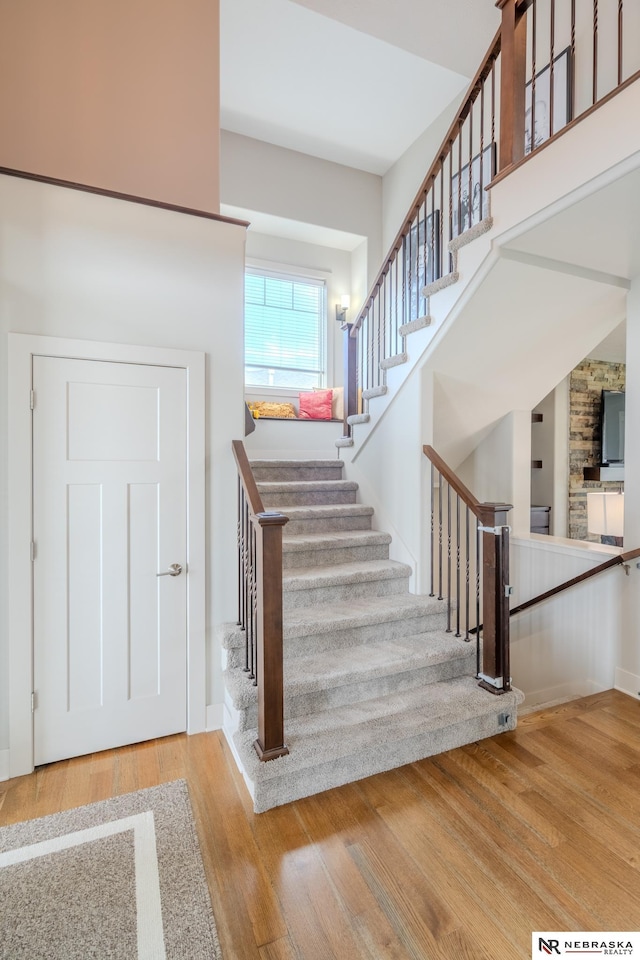 6707 S 209th St, Omaha, NE 68022 - stairs featuring wood finished floors