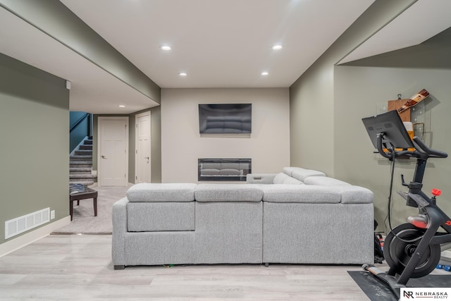 6707 S 209th St, Omaha, NE 68022 - living area with light wood-type flooring, recessed lighting, stairway, and baseboards
