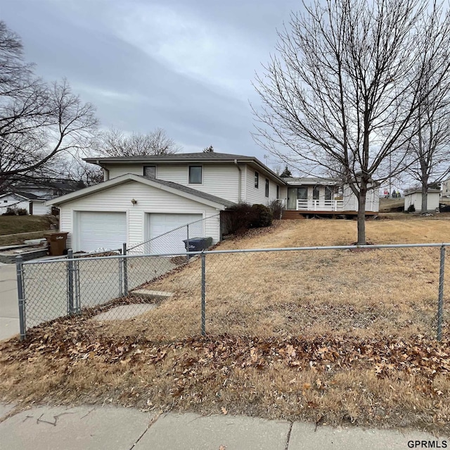 view of side of property featuring fence
