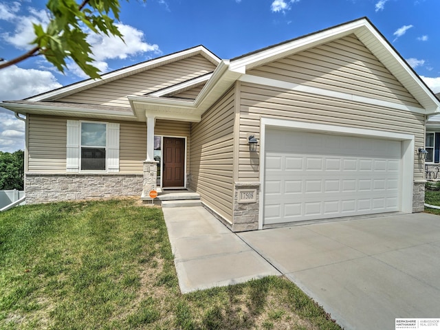 ranch-style house with stone siding, a garage, a front yard, and concrete driveway