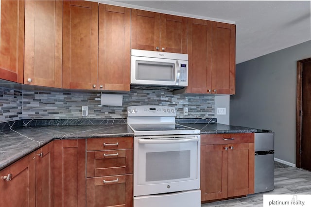 13253 Josephine St, Omaha, NE 68138 - kitchen featuring white appliances, tasteful backsplash, light wood-style floors, and brown cabinetry