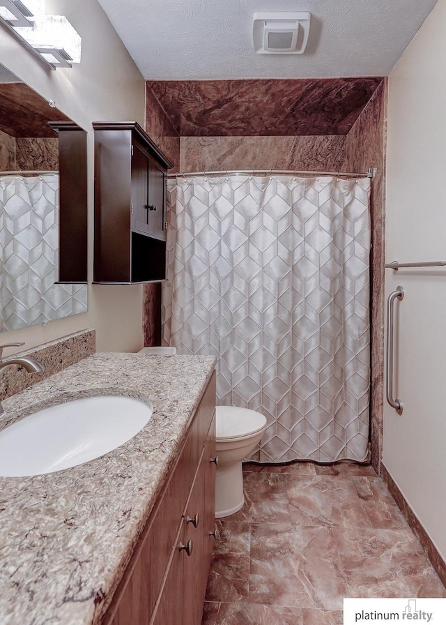 13253 Josephine St, Omaha, NE 68138 - full bathroom with vanity, toilet, baseboards, a shower with shower curtain, and a textured ceiling