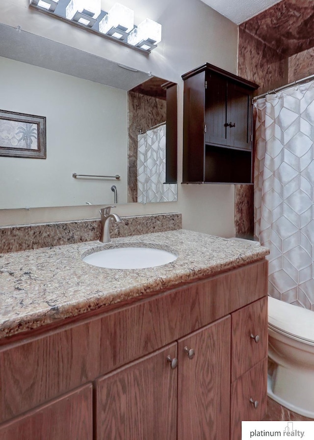 13253 Josephine St, Omaha, NE 68138 - full bathroom with vanity, toilet, and curtained shower