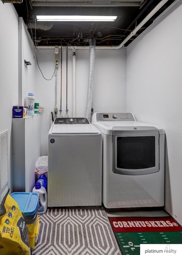 13253 Josephine St, Omaha, NE 68138 - laundry area featuring separate washer and dryer