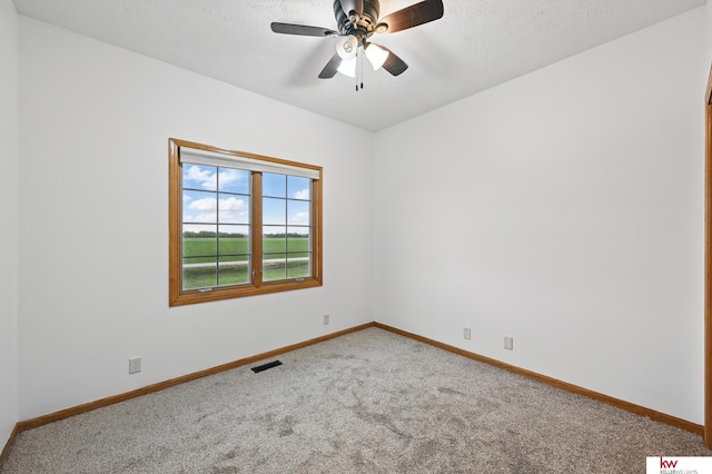 60050 Karns Rd, Pacific Junction, IA 51561 - empty room with carpet flooring, baseboards, and a ceiling fan
