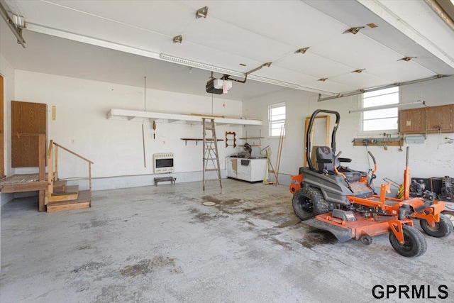 garage with heating unit and a garage door opener