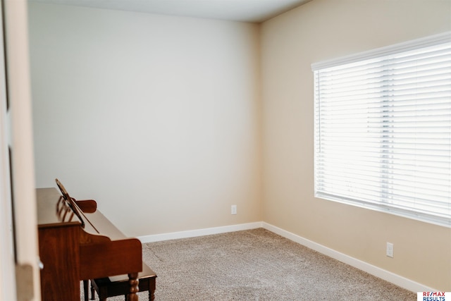 7202 N 167th Ave, Bennington, NE 68007 - unfurnished room with healthy amount of natural light, carpet flooring, and baseboards