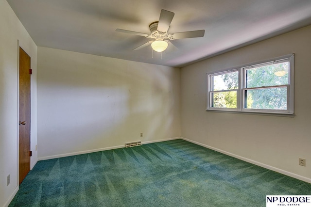 2352 Lincoln St, Blair, NE 68008 - carpeted spare room featuring baseboards and a ceiling fan
