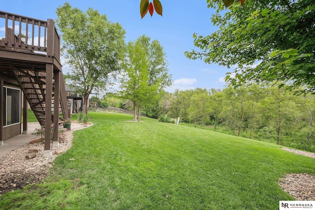 2705 N 189th St, Omaha, NE 68022 - view of grassy yard with stairway and a deck