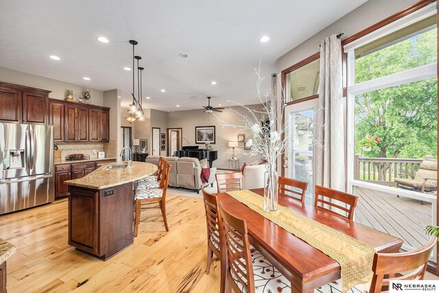 2705 N 189th St, Omaha, NE 68022 - dining area with ceiling fan, light wood-style floors, and recessed lighting